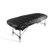 Killer Ink black elasticated bed cover fitted on portable massage table