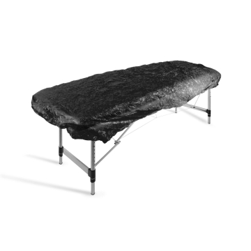 Killer Ink black elasticated bed cover fitted on portable massage table