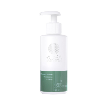 Un flacon pompe blanc étiqueté « Rosa - Concentré de savon blanc aux herbes 150 ml » avec des accents verts, pour une utilisation dans le maquillage permanent, le microblading et le soin des tatouages.